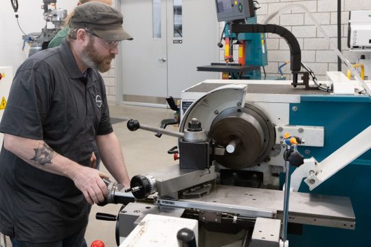 apprentice running machine at STOBER Drives apprenticeships & students